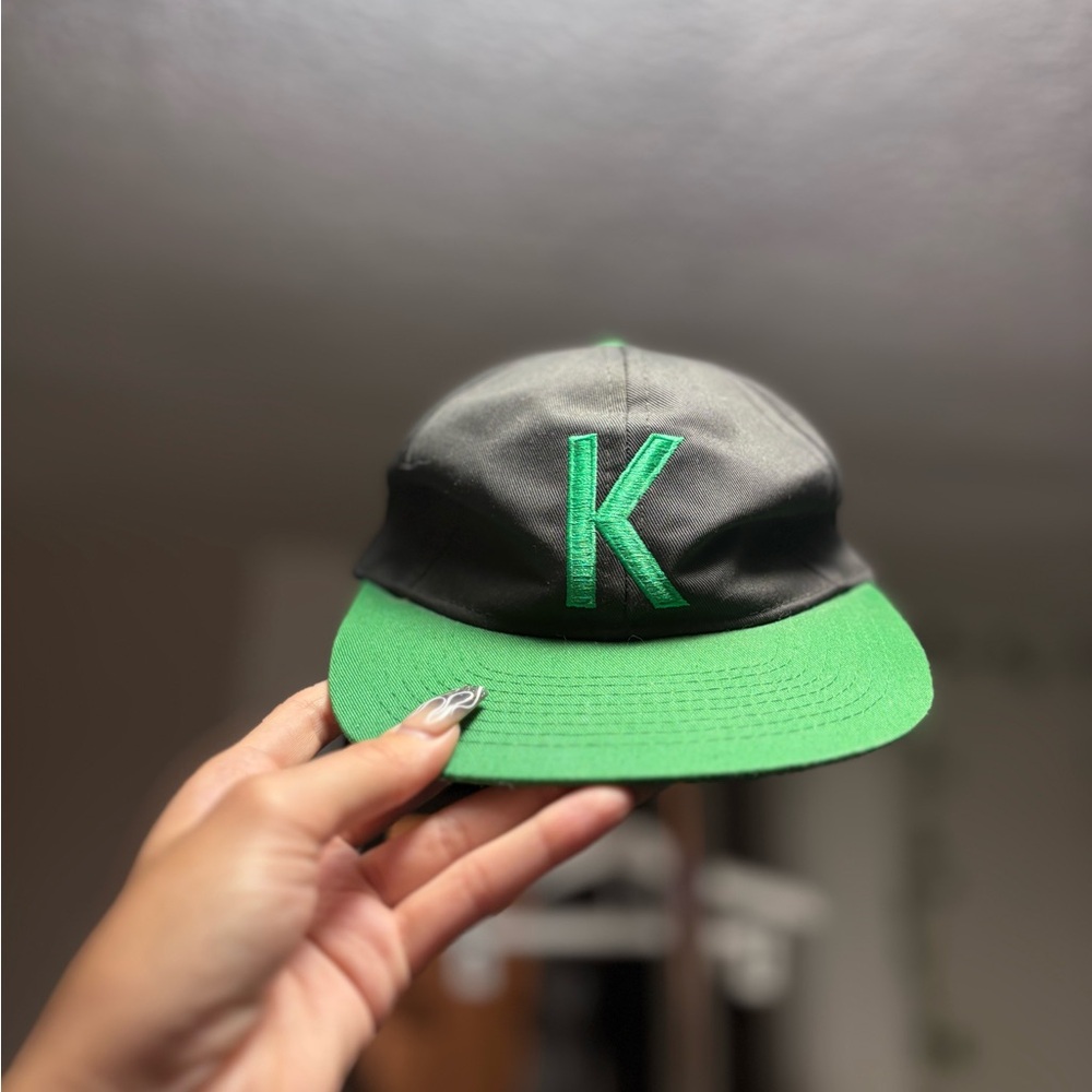 Green and Black Cap with K Logo